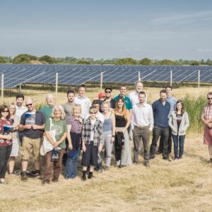 Locals soak up the sun at their 36,000 panel Community Solar Farm